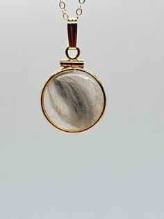 Up for sale:  NEW  16.5 mm Handmade 14k solid gold fur or hair pet memorial locket. These lockets can be opened with a small screwdriver.  They are new and comprised of a solid gold bezel and two Lucite covers and a solid 14k gold filled snap bail.  You can choose solid 14k snap bail as well. Locket hallmarked 14k.  You can choose your size of 14k gold filled cable chain at checkout. This pet memorial locket can be viewed from both sides and will store and display your pet's fur. I have made ton Hair Locket, Memory Locket, Faceted Gems, Handmade Pet, Gold Locket, Memorial Jewelry, Pet Memorial, Locket Necklace, Gold Filled Chain