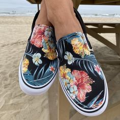 Whether you're from the islands or dreaming of a tropical getaway, these slip-ons are perfect for any occasion! Who needs a Corona, find your beach with these shoes!!These shoes make you feel the Hawaiian Vibes. Tropical Floral Pattern printed all over the Navy Slip on Vans. Custom Made-to-Order shoes. Perfect for a Tropical Vacation or wearing during your wedding. Going to Hawaii for a wedding? These are the wedding shoes you need. We buy each pair of shoes BRAND NEW. Each pair is made to order Beach Slip-on Low-top Sneakers, Slip-on Low-top Beach Sneakers, Comfortable Slip-on Sneakers For The Beach, Beach Slip-on Sneakers, Beach Slip-ons, Low-top Slip-ons For The Beach, Custom Slip On Vans, Black Vans Shoes, Black Slip On Vans