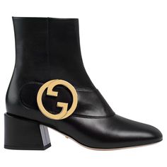 The design for this boot was inspired from 1970's archive pieces. The boots feature the vintage monogram round interlocking g detail in gold tone hardware. The boots are constructed of black leather with zip closure. The vintage Gucci logo detail provide a retro look! 700016 Color: Black Material: Leather Size: 39 EU / 8 US Heel Height: 50 mm / 2” Condition: Excellent. Like new. Tried on, but not worn. Made in Italy Gucci Boots, Vintage Monogram, Gucci Leather, Gucci Black, Retro Look, Vintage Logo, The Vintage, Vintage Gucci, Block Heels