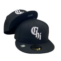 two black hats with the word gh on them, one is white and the other has