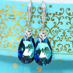 "Blue Earrings Peacock Earrings Bridesmaid Earrings Bridal Earrings Blue Navy Earrings Peacock Wedding Gift for Her Swarovski Earrings Matching Necklace available here (last picture): https://www.etsy.com/listing/240367795/bermuda-blue-swarovski-crystal-necklace Entire Bermuda Blue jewelry collection can be viewed here: https://www.etsy.com/shop/LittleDesirezJewelry/search?search_query=bbℴ=date_desc&view_type=gallery&ref=shop_search * Available in MORE COLORS, please refer to the color c Blue Drop Earrings For Bridal Gift, Blue Bridal Drop Earrings As A Gift, Elegant Turquoise Drop Crystal Earrings, Blue Ear Wire Earrings For Wedding, Elegant Blue Teardrop Earrings For Party, Blue Teardrop Earrings For Wedding, Elegant Peacock Colored Jewelry For Formal Occasions, Elegant Turquoise Earrings For Wedding, Blue Drop Bridal Earrings For Party