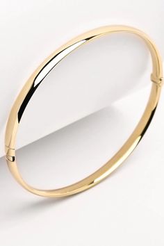 Buy a unique bangle bracelet for women. | Discover a large collection of everyday sparkling jewels. | ✅ We offer FREE Worldwide Shipping. Elegant 14k Gold Hoop Bangle, Elegant Bangle With Gold Clasp, Elegant Bracelets With Gold Clasp, Minimalist Yellow Gold Oval Bracelet, Elegant Hoop Bangle With Polished Finish, Classic Gold Hoop Bracelet For Formal Occasions, Elegant Gold Clasp Bangle For Gift, Elegant Bangle With Gold Clasp For Gift, Elegant Gold Hoop Bracelets