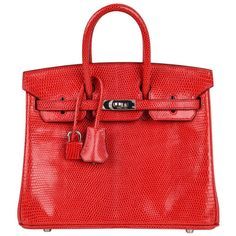 Guaranteed authentic Hermes Birkin 25 bag Rouge Exotic in rare coveted Lizard. Toned down strawberry red that is utterly neutral and striking. Fresh with palladium hardware. Comes with lock, keys, clochette, sleepers, raincoat and signature Hermes box. NEW or NEVER WORN. final sale BAG MEASURES: LENGTH 25cm / 9.75" TALL 18.5 cm / 7.25" DEEP 13cm / 5.25" HANDLES: TALL 3" CONDITION: NEW or NEVER WORN Hermes Birkin Bag 25, Rare Hermes Birkin, Hermes Birkin Bag, Hermes Birkin Handbags, Birkin Handbags, Hermes Birkin 25, Hermes Box, Birkin 25, Lv Handbags