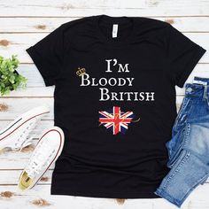 4X I'm Bloody British Unisex Softstyle T-Shirt The unisex soft-style t-shirt puts a new spin on casual comfort. Made from very soft materials, this tee is 100% cotton for solid colors. Heather colors and sports grey include polyester. The shoulders have twill tape for improved durability. There are no side seams. The collar is made with ribbed knitting to prevent curling damage. .: 100% Cotton (fiber content may vary for different colors) .: Light fabric (4.5 oz/yd² (153 g/m .: Eurofit .: Tear-a British Funny, Funny British, Kings Coronation, Coronation Day, Queen Camilla, Uk Flag, King Charles Iii, Uk Gifts, Pride Tshirts