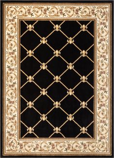 a black and white rug with gold trimmings on the edges, in an ornate pattern