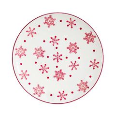 a red and white plate with snowflakes on it