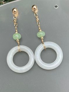 Green gemstones and 14k gold filled dangle earrings, 14k gold filled posts and components. Chrysoprase and light green jade gemstones complement the gold filled elements perfectly. Earrings are 1 3/4 inches long. White Jade Dangle Jewelry, Pebble Jewelry, Luxe Jewelry, Earrings Gemstone, Jade Earrings, Lovely Necklace, Bead Jewelry, Green Gemstones, Gorgeous Necklaces