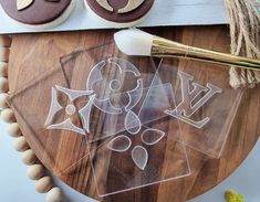 a wooden table topped with cookies and other items