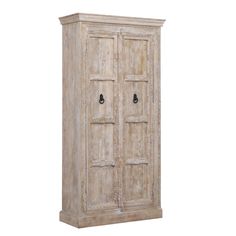 an old wooden cabinet with two doors