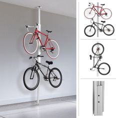 the bike is hanging on the pole in the room