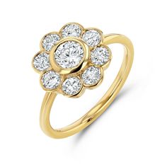 a yellow gold ring with diamonds on it