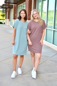 Short sleeve ribbed shirt dress with a single front pocket Available in kelly green, orchid, peppercorn, and sage Sizes S, M and L Spring Ribbed Button-up Dress, Green Knee-length Buttoned Shirt Dress, Spring Green Cotton T-shirt Dress, Green Short-sleeve Shirt Dress With Pockets, Green Knee-length Shirt Dress With Button Closure, Green Orchid, Ribbed Shirt, Kelly Green, Front Pocket