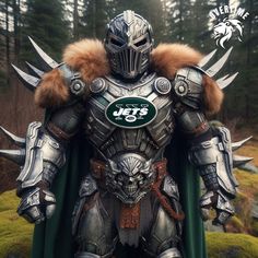 a man dressed in armor and holding a green cape