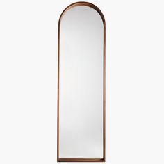 an arched mirror on a white background