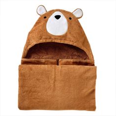 a brown teddy bear hat with its eyes open