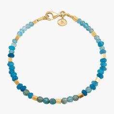 Inspired by the sea and sky, this bracelet features beautiful beads that vary from light to deep shades of blue. It’s finished with golden tone stations that look rich and lustrous against the beads. Mix it up with bracelets for a playful look. The piece comes with a ".925" sterling silver quality stamp as a symbol of guaranteed product quality. Look Rich, How To Look Rich, Jade Bracelet, Women Artisans, Silver Pieces, Gold Plated Silver, By The Sea, Shades Of Blue, Sterling Silver Jewelry