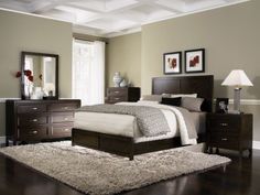 a bedroom scene with focus on the bed and dressers