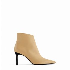 Material: Leather 3.5” Heel Color: Vanilla Yellow New In Box Yellow Leather Square Toe Heels, Yellow Leather Heels For Fall, Chic Yellow Heels For Fall, Beige Ankle Boot Heels For Work, Chic Yellow Boots For Fall, Beige Leather Heels With Padded Ankle, Yellow High Heel Leather Boots, Zara Beige High Heel Boots, Chic Beige Boots With 4-inch Heel