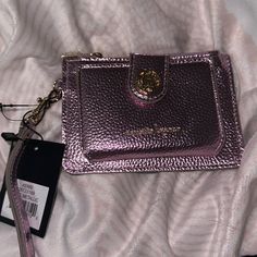 Nwt Nanette Lepore Pink Metallic Vegan Leather Wristlet 3 Card Slots Snaps Open Has Zipper Coin Pocket And Pocket On Back Comes With Wristlet Strap Removable Too Gold Accents So Cute Brand New Smoke Free Home Pink Pouch Wristlet With Strap, Pink Pouch Wristlet With Wrist Strap, Pink Pouch Wallet With Wrist Strap, Pink Clutch Wallet With Wrist Strap, Pink Wallet With Wrist Strap As Gift, Trendy Pink Rectangular Wristlet, Pink Wristlet For Daily Use, Pink Wristlet With Wrist Strap For Daily Use, Chic Pink Wristlet For Travel