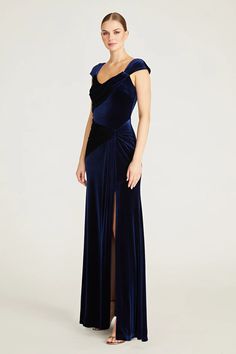 Lou Velvet Draped Gown – THEIA Deep Blue Formal Dress, Dark Jewel Tone Bridesmaid Dresses, Celestial Wedding Bridesmaid Dresses, Bridesmaid Winter Dresses, Blue Winter Bridesmaid Dresses, Velvet A Line Dress, Velvet Blue Dress, Dark Blue Velvet Dress, Velvet Gowns