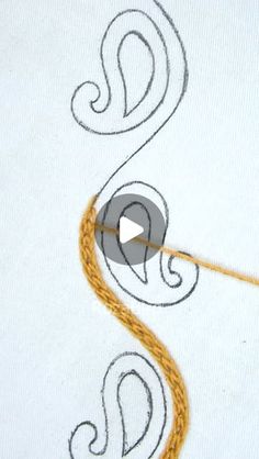 a video demonstrating how to do an embroidery work on a t - shirt with thread