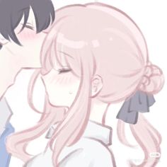 two anime characters are kissing each other