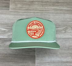 Custom made with a rad park patch & a retro poly rope hat  Taller profile, but fits most heads well up to size 7-5/8 *This is a medium profile (slightly taller) hat that will fit good on medium-large heads *Please feel free to ask questions about the fit; we don't mind at all! *Each listing includes 1 patch, 1 hat & a production fee for us to make the hat for you.   If this hat/patch isn't your style, then check out the 100s of other patches & blanks that we have to create your own wearable masterpiece. Simply pick a patch, pair with the perfect hat and we will do the rest! Vintage Trucker Hat For Outdoor Activities, Green Vintage Trucker Hat For Outdoor, Retro Trucker Hat With Flat Bill For Outdoor, Vintage 5-panel Hat For Outdoor Activities, Retro Flat Bill Trucker Hat For Outdoor, Vintage Green Adjustable Snapback Hat, Green Vintage Adjustable Snapback Hat, Green Adjustable Vintage Snapback Hat, Retro Trucker Hat With Curved Brim For Outdoor Activities