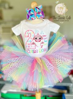 Baby Shark Tutu birthday outfit is custom made and includes: *top with name  *tutu *bow with headband (bow clips onto headband) Color changes are welcome. Send us a message!  We would love to create the perfect outfit for you! Baby Shark Two Two Two Girl, Baby Shark 2nd Birthday Party Girl, Baby Shark Birthday Party Girl, Tutu Birthday Outfit, Second Birthday Boys, Mommy Shark, Shark Girl, Baby Shark Birthday, Birthday Painting