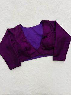 This is a very beautiful handmade purple colour blouse for women and girls. you can wear this blouse on occasions like diwali, wedings, engagement, anniversaries etc. this blouse can be used for gifting purpose also. this trendy beautiful blouse can give your personality a elegant look. you can wear this blouse with very beautiful sarees and lehangas. we will do the customization also as per the customer need. free shipping worldwide Fitted Purple Silk Blouse, Fitted Purple Silk Tops, Elegant Semi-stitched Purple Blouse, Elegant Purple Blouse For Diwali, Semi-stitched Purple Blouse For Wedding, Elegant Purple Blouse With Pallu, Purple Short Sleeve Blouse For Party, Purple Long Sleeve Padded Blouse, Purple Padded Long Sleeve Blouse