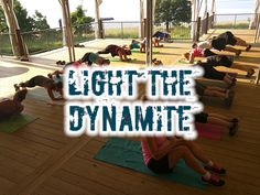 a group of people doing yoga on mats with the words light the dynamitete over them