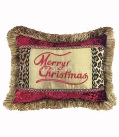 a decorative pillow with the words merry christmas on it