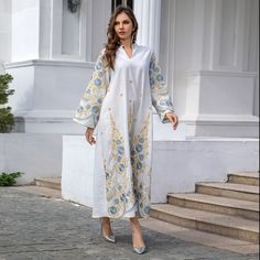 Description Details: Material: Polyester Pattern: Floral Style: Ethnic Style Season: Summer Fitness: Regular Collar Type: V-Neck Sleeve Type: Regular Sleeve Sleeve Length: Long Sleeve Hem Shaped: General Elasticity: Non-Elasticity Occasion: Casual Craft: Embroidery Size M L XL Length(CM) 134 134 135 Bust(CM) 108 113 117 Sleeve(CM) 57 57 57 Traditional Embroidered V-neck Dress For Eid, Spring V-neck Kaftan With Chikankari Embroidery, Eid Chikankari Embroidery V-neck Dress, V-neck Embroidered Dress With Resham For Eid, Traditional V-neck Embroidered Dress For Spring, Traditional Embroidered V-neck Dress For Spring, Eid V-neck Dress With Resham Embroidery, Traditional V-neck Spring Dress, Traditional Spring Embroidered Dress With V-neck