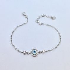 Mother of Pearl Evil Eye Bracelet, Gold Evil Eye Bracelet, 925 Silver Sterling Bracelets for Women, Handmade Jewelry, Gift for Wife Absolutely EYE catching! A beautiful round mother of pearl with an inlaid evil eye. I paired this one with a beautiful beaded curb chain. This beauty will keep bad spirits at bay, and good ones in your corner, Enamel Evil Eye bracelet, Gold Evil Eye bracelet, 925 Silver sterling, Handmade Jewelry Your choice Sterling silver or Gold vermeil with gold filled chain. Mo Pure Silver Bracelet For Women, Sterling Silver Evil Eye Bracelet As Gift, Silver Sterling Silver Beaded Bracelets, Silver Beaded Bracelet With Adjustable Chain In Sterling Silver, Sterling Silver Beaded Bracelet With Adjustable Chain, White Sterling Silver Crystal Bracelet, Dainty Sterling Silver Round Bracelet, Dainty Silver Evil Eye Bracelet As Gift, Sterling Silver Round Bracelets For Gifts