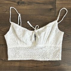 Nwt White Embroidered Crop Top Never Worn, Cute Detailed Crop Top Fitted Casual Crop Top With Floral Embroidery, Cotton Crop Top With Floral Embroidery For Vacation, Casual Cotton Crop Top With Floral Embroidery, Embroidered Cropped Tops For Vacation, Floral Embroidered Cotton Crop Top For Vacation, Casual White Crop Top With Floral Embroidery, Casual White Embroidered Crop Top, White Fitted Crop Top With Floral Embroidery, White Embroidered Cropped Top