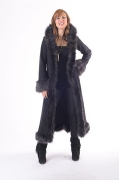 This long winter coat is soft and warm yet lightweight at the same time and is made from the highest quality materials. This is one of my most popular styles. Large fabric covered hook closures in the front. Outer pockets lie flat against the sides. Can also be ordered without a hood or shorter in length. Sizing is 1 (small/medium) or 2 (medium/large). Features: * Large fabric covered hook closures in the front. * Lined with double layer anti-pill polar fleece. * Outer pockets lie flat against t Afghan Coat, Festival Jacket, Wedding Costume, Long Winter Coats, Jacket With Hood, Long Winter, Festival Wedding, Black Faux Fur, Coat Black