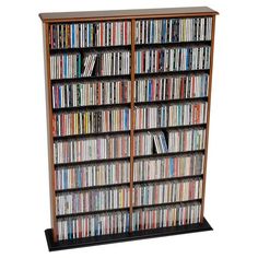 a large wooden bookcase filled with lots of dvd's