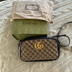 Authentic Small Gucci Marmont Bag Comes With A Receipt! Bought In San Diego This Is A Crossbody Bag Which Comes With A Top Zip Closure And A Structured But Soft Shape. Black Matelasse Leather With Cloth Gg Pattern. Adjustable Shoulder Strap! Made In Italy I Love This Bag, Used It For A Couple Of Months But It's Still In Great Condition. It Has Some Signs Of Wear On The Inside Because It's A Light Soft Leather Inside. Gg Sign Is A Little Silver Now(You Can See On The Picture. Gucci Marmont Bag, Gucci Marmont, Gucci Bags, Soft Leather, San Diego, Crossbody Bag, Shoulder Strap, Limited Edition, Bag Lady