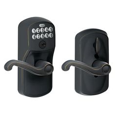 an image of two black door handles with keys on each side and one has a keyhole