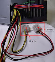 the wiring for an electronic device is shown in red and yellow wires are connected to each other