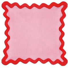 a pink and red place mat with scalloped edges on a white background,