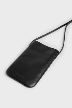 Leather Mobile Phone Bag For Work, Leather Mobile Phone Bags For Workwear, Modern Pouch Phone Bag, Modern Soft Leather Phone Bag, Modern Black Leather Phone Bag, Modern Leather Phone Bag For Travel, Modern Leather Phone Bag With Detachable Strap, Modern Leather Phone Bag With Removable Pouch, Modern Soft Leather Phone Bag For Everyday