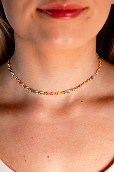 Add a pop of color to your outfit with the Paulina choker necklace. Made of stainless steel with gold plating, it features vibrant enamel links and an adjustable length for a perfect fit. Stand out from the crowd in style! Water resistant! Colorful Jewelry With Adjustable Chain, Adjustable Multicolor Metal Chain Necklace, Multicolor Chain Choker Jewelry, Trendy Adjustable Chain Choker Necklace, Multicolor Clavicle Chain Choker As Gift, Trendy Multicolor Metal Chain Necklace, Trendy Multicolor Choker With Adjustable Chain, Trendy Multicolor Metal Necklaces, Trendy Colorful Necklace With Adjustable Chain