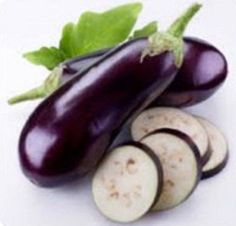 an eggplant and four slices on a white background