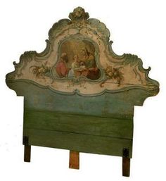 an old painted bed frame with people on it