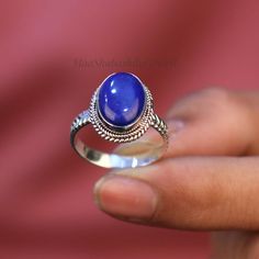 "Natural Oval Lapis Lazuli Ring, Silver Lapis Ring, Bohemian Handmade Ring, 925 Sterling Silver Designer Ring, Rings For Women, Wedding Ring SHOP LINK:- https://www.etsy.com/shop/MaaShabashibaJewell?ref=seller-platform-mcnav 》D E T A I L S《 Gemstone: Natural Lapis Lazuli                     Gem Color: Blue                                 Stone Shape: Oval                                       Metal: 925 Sterling Silver Purity: 925 Parts Per 1000 Setting Type: Bezel Set Silver Polish: High Ring S Handmade Oval Sapphire Rings, Spiritual Sapphire Oval Rings, Bohemian Oval Hallmarked Rings, Handmade Oval Stackable Rings For Wedding, Handmade Oval Stackable Wedding Rings, Handmade Stackable Wedding Rings, Bohemian Sterling Silver Oval Cabochon Rings, Blue Oval Moonstone Bohemian Ring, Blue Oval Moonstone Ring Bohemian Style