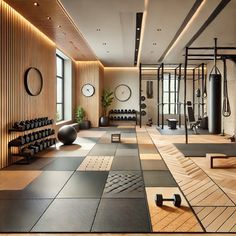 a large room with many different types of yoga mats on the floor and exercise equipment