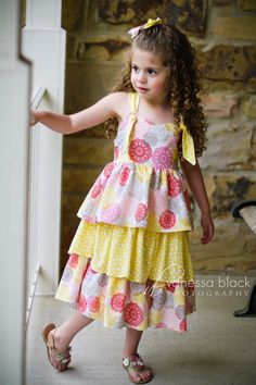 Eden Dress is a classic 3 tiered twirly dress that will make everyone turn head. The design is perfect for a special occasion or just a fun fancy dress to wear every day.   The dress has adjustable straps and elastic back (with NO SHIRRING) to allow it to grow with your child. This outfit will be part of your little one's wardrobe all year round. It is also great for layering with a t-shirt during colder weather, and it will be fresh yet stylish to be worn during summer.  The pattern comes with Cute Tiered Ruffled Sundress, Cute Tiered Ruffle Sundress, Cute Tiered Dress With Ruffle Hem, Cute Tiered Sundress With Ruffle Hem, Cute Sundress With Adjustable Straps, Cute Sundress With Ruffled Adjustable Straps, Cute Tiered Sundress, Couture Bb, Eden Dress