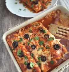 an enchilada casserole with olives and cheese