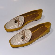 Elevate Your Shoe Game With These Chic Tory Burch Loafers. The Slip-On Design Features A Round Toe And A Collapsible Back For Versatile Wear. The Leather Upper, Lining, And Accents Including A Logo Charm Exude Luxury, While The Animal Print Pattern Adds A Touch Of Fun. Perfect For Any Occasion, These Flats Can Be Dressed Up For A Party, Worn Casually, Or Paired With Business Attire. The Cushioned Footbed Ensures Maximum Comfort, Making Them An Ideal Choice For All Seasons. Available In Size 5.5 Us/3 Uk/35.5 Eu, These Tory Burch Tory Charm Flats Are A Must-Have Addition To Your Wardrobe. New Without Box Outsole Has Remnants Of Sticker Adhesive Retail Price : $348 Guaranteed 100% Authentic Luxury Flat Loafers For Spring, Luxury Spring Loafers With Round Toe, Luxury Round Toe Loafers For Spring, Luxury Spring Office Flats, Yellow Flat Heel Loafers For Fall, Fall Yellow Loafers With Flat Heel, Yellow Loafers For Fall, Fall Yellow Loafers, Luxury Spring Slip-ons With Round Toe