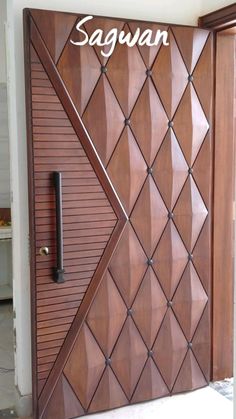 a wooden door with an intricate design on it